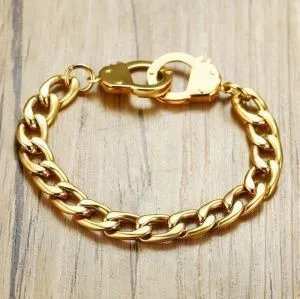 Браслет с замком в виде наручников. Нержавеющая сталь. Цвет золотой.