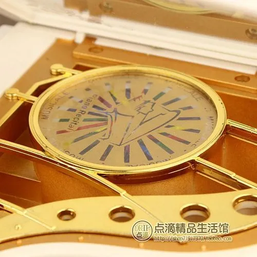 Музыкальная шкатулка Рояль. Материал - АБС пластик. Цвет белый. Размер 15 х14 х15,5 см.